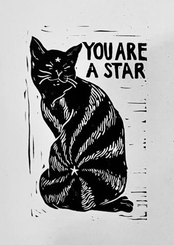 woodblock print of a cat with the words You are a star. 