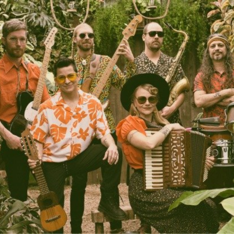 An image of the band Las Montañitas, six members. 