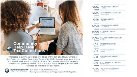 Two women looking at a computer 