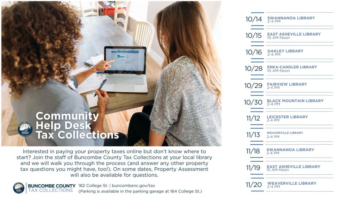 Two women looking at a computer 